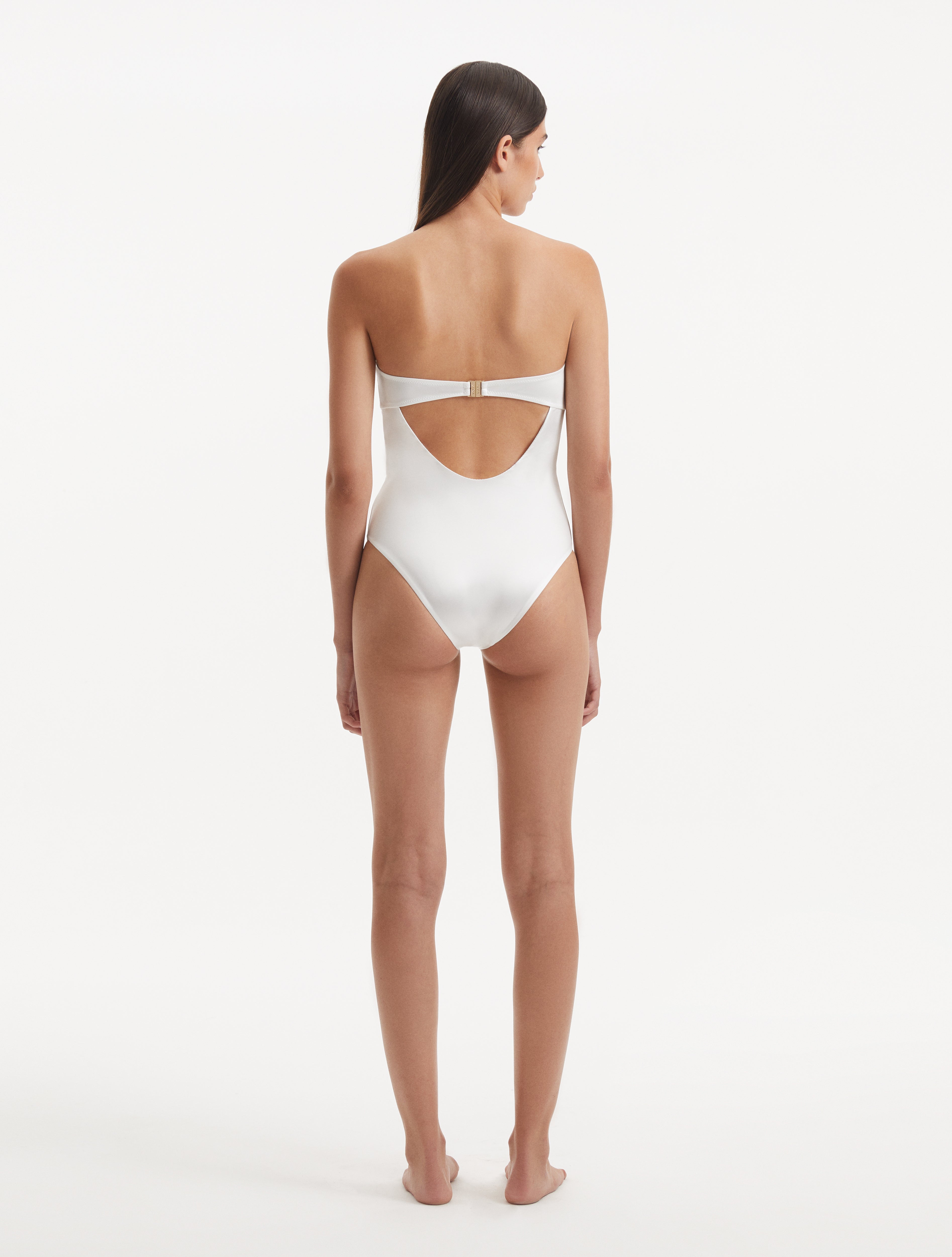 Kenna White Bandeau Satin Swimsuit | Moeva | Swimsuit | Each week unveils new pieces—luxury swimwear, fluid resort silhouettes, and elevated summer-to-evening essentials designed to carry you from coastal escapes to city nights.