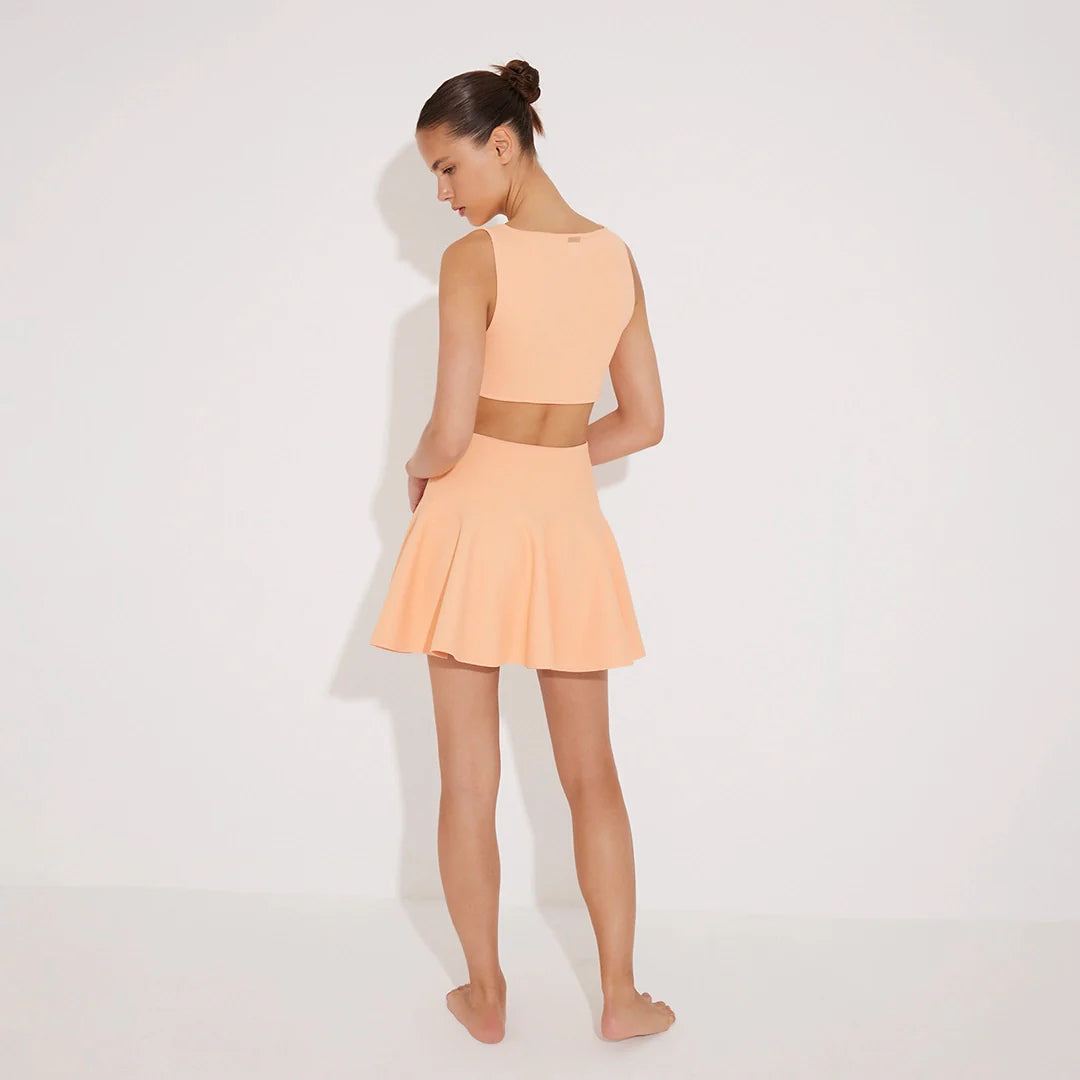 Lanao Orange Cut-Out Knit Mini Dress with Gold Detail | Moeva | Dress | Each week unveils new pieces—luxury swimwear, fluid resort silhouettes, and elevated summer-to-evening essentials designed to carry you from coastal escapes to city nights.