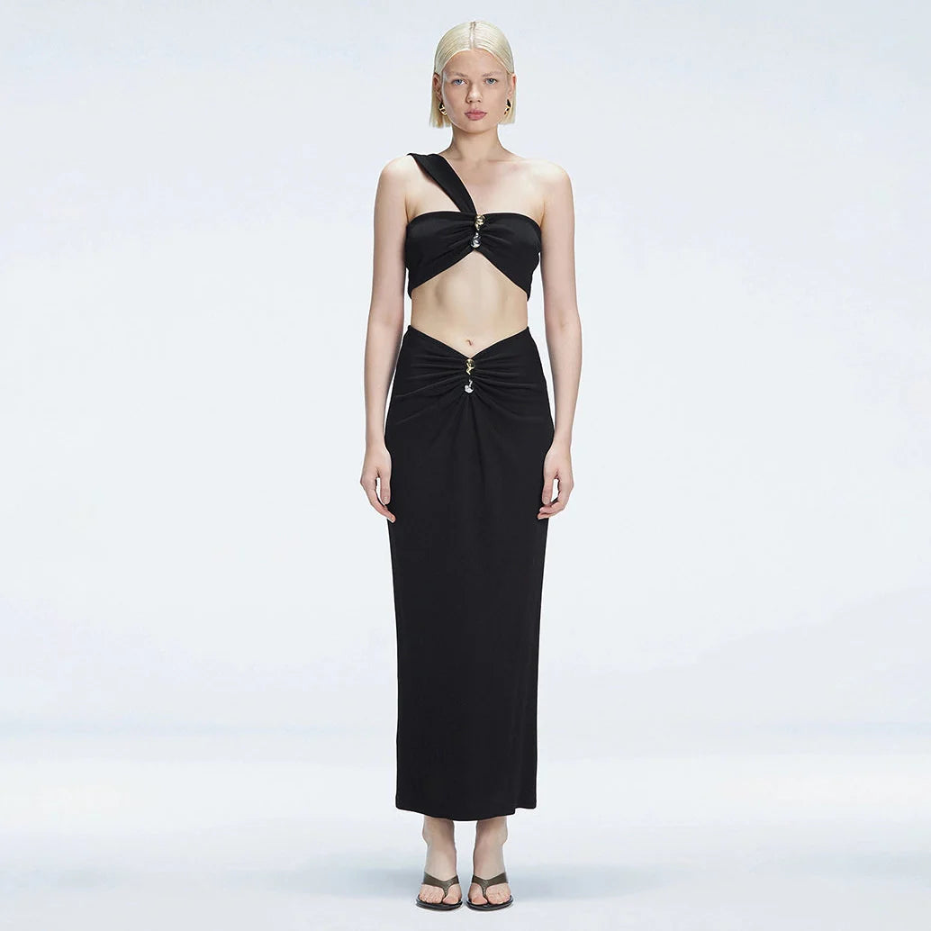 Lane One-Shoulder Black Crop Top and Esmeralda Maxi Skirt with Front Ruched Detail | Moeva | Set | Each week unveils new pieces—luxury swimwear, fluid resort silhouettes, and elevated summer-to-evening essentials designed to carry you from coastal escapes to city nights.