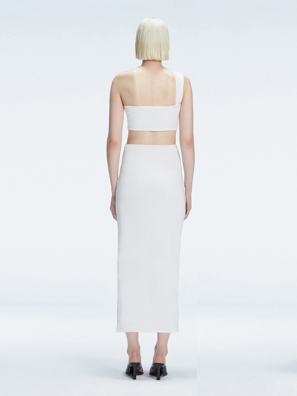 Esmeralda White Maxi Skirt with Front Ruched Detail | Moeva | Skirt | Each week unveils new pieces—luxury swimwear, fluid resort silhouettes, and elevated summer-to-evening essentials designed to carry you from coastal escapes to city nights.