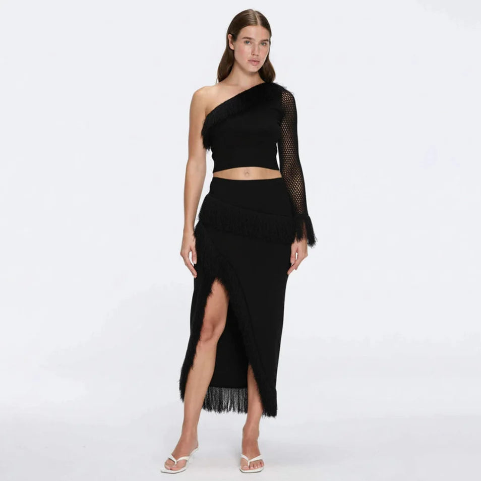Alani Black Fringe Detail Asymmetric Slit Midi Skirt | Moeva | Skirt | Each week unveils new pieces—luxury swimwear, fluid resort silhouettes, and elevated summer-to-evening essentials designed to carry you from coastal escapes to city nights.