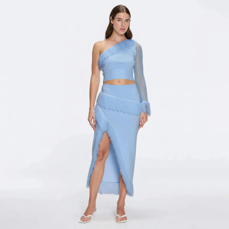 Alani Blue Fringe Detail Asymmetric Slit Midi Skirt | Moeva | Skirt | Each week unveils new pieces—luxury swimwear, fluid resort silhouettes, and elevated summer-to-evening essentials designed to carry you from coastal escapes to city nights.