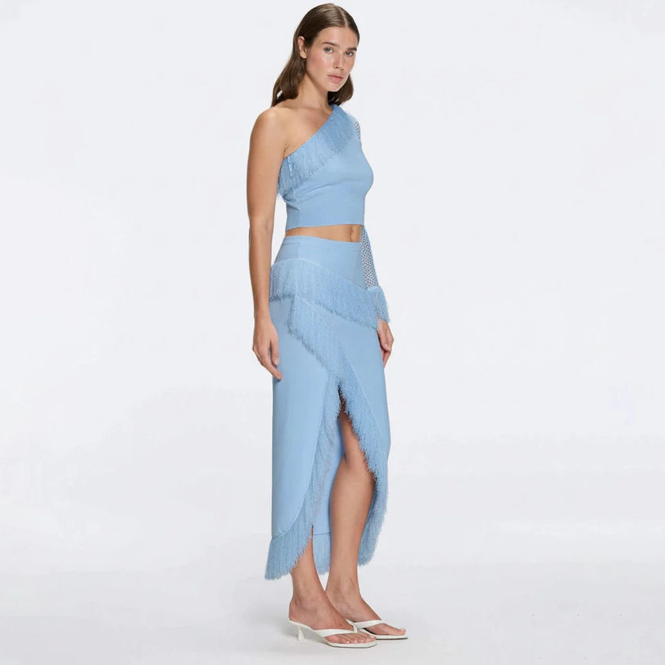 Alani Blue Fringe Detail Asymmetric Slit Midi Skirt | Moeva | Skirt | Each week unveils new pieces—luxury swimwear, fluid resort silhouettes, and elevated summer-to-evening essentials designed to carry you from coastal escapes to city nights.