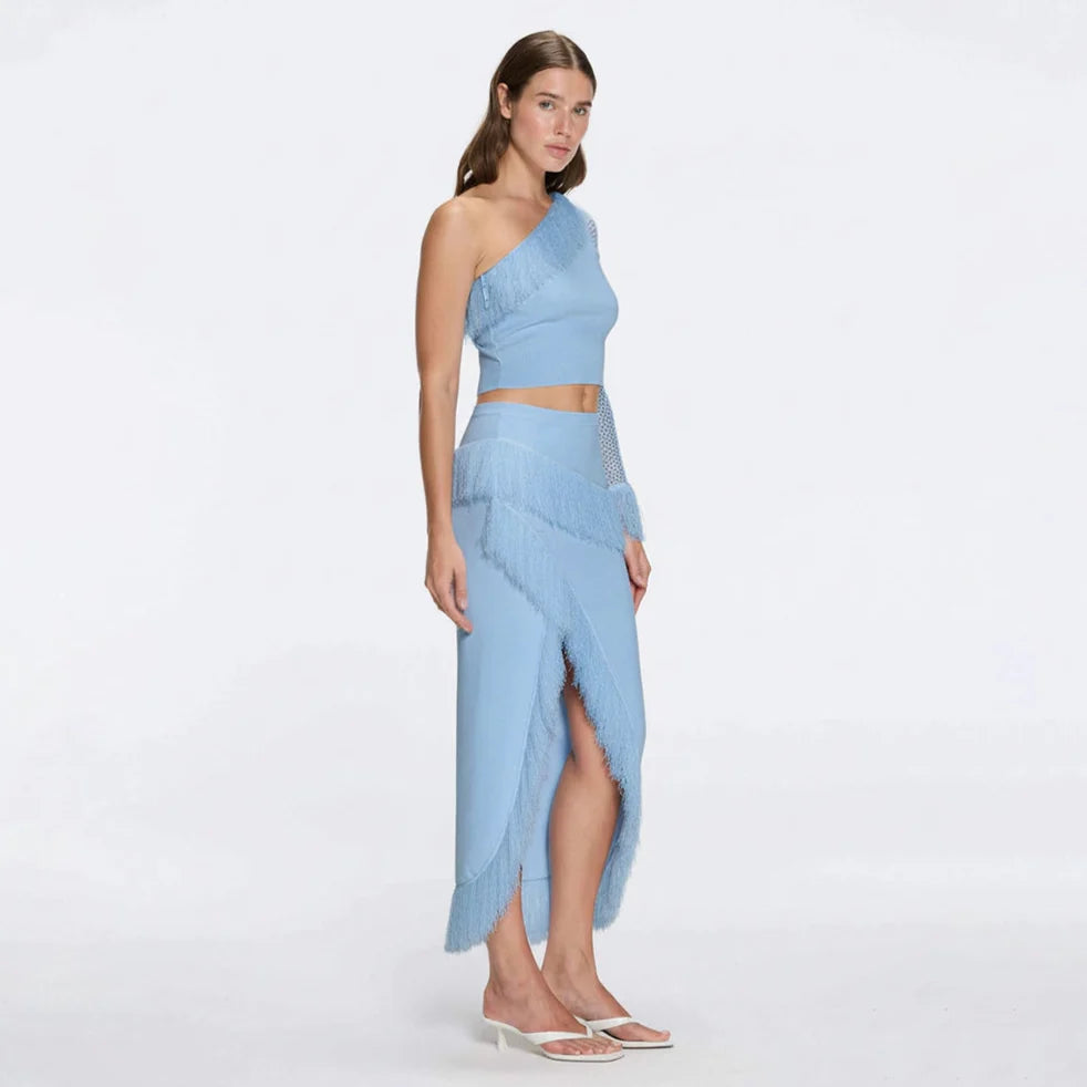 Monroe & Alani Fringe Asymmetric Knit Blue Set | Moeva | Set | Each week unveils new pieces—luxury swimwear, fluid resort silhouettes, and elevated summer-to-evening essentials designed to carry you from coastal escapes to city nights.