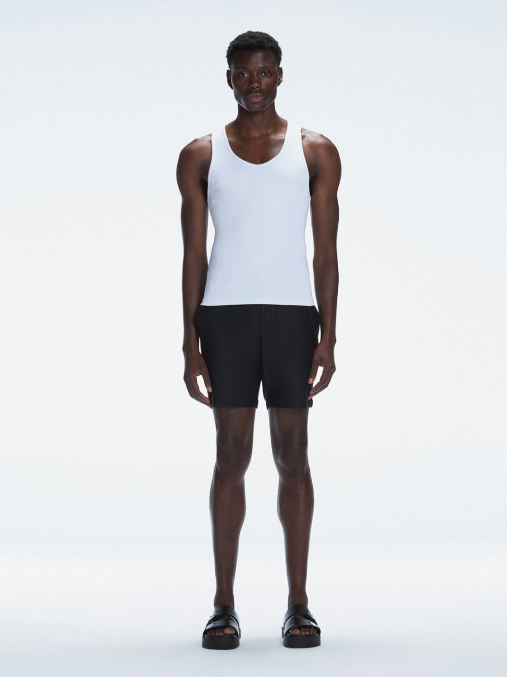 Phillip White Tank Top | Moeva | T-Shirt | Each week unveils new pieces—luxury swimwear, fluid resort silhouettes, and elevated summer-to-evening essentials designed to carry you from coastal escapes to city nights.