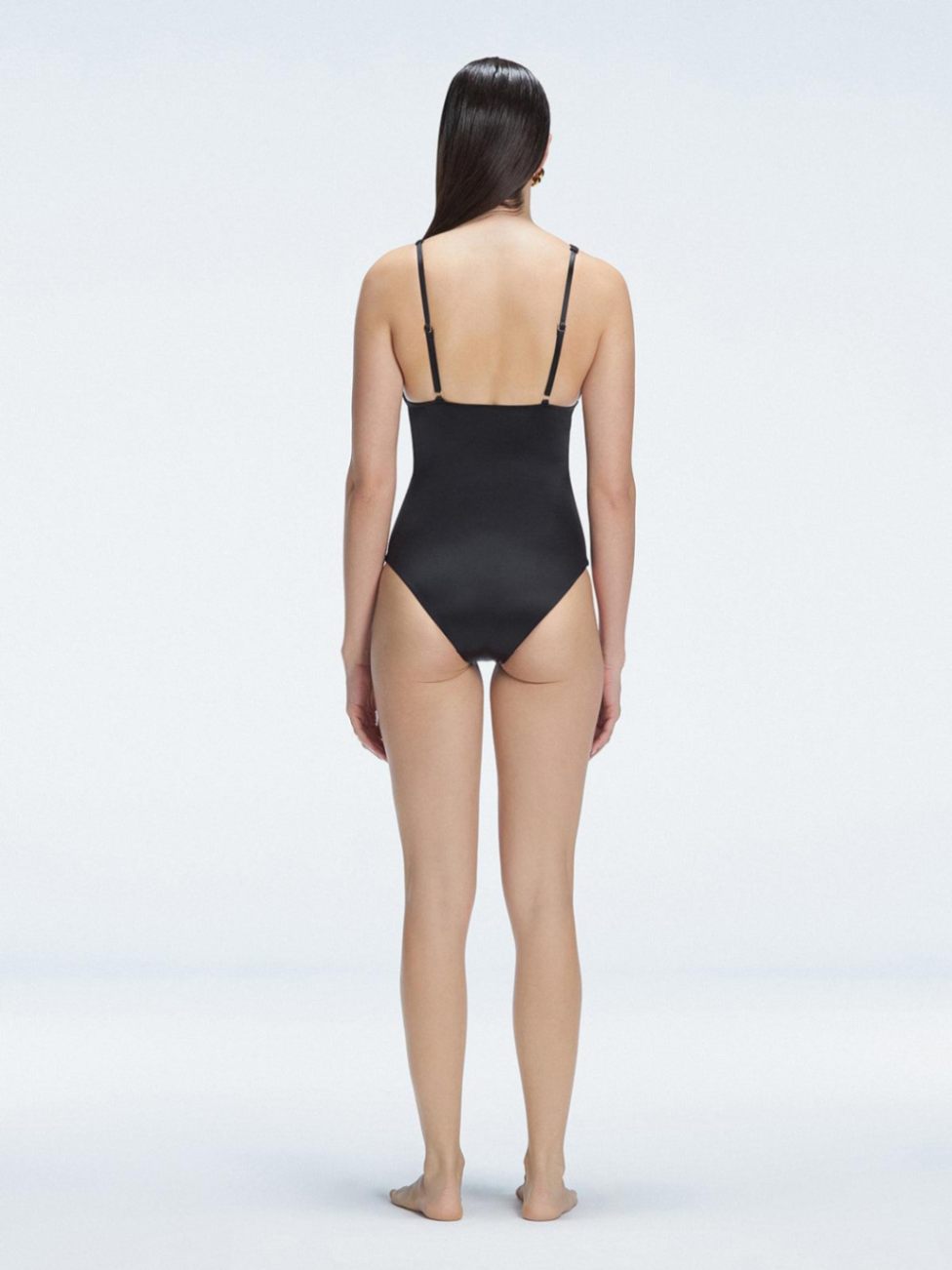Marina Black V Neck Swimsuit | Moeva | Swimsuit | Each week unveils new pieces—luxury swimwear, fluid resort silhouettes, and elevated summer-to-evening essentials designed to carry you from coastal escapes to city nights.