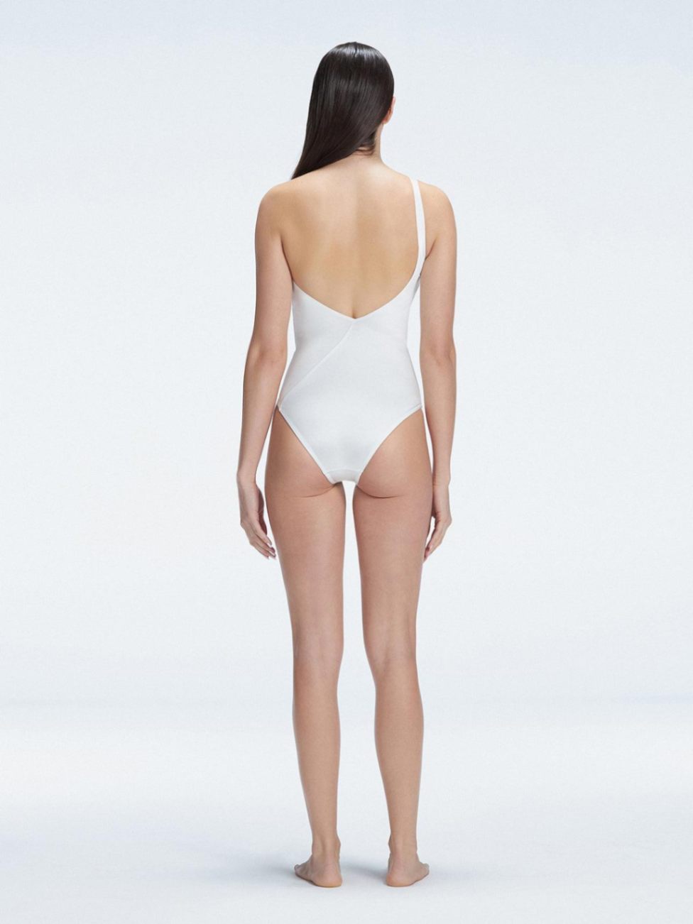 Solene White One Shoulder Swimsuit | Moeva | Swimsuit | Each week unveils new pieces—luxury swimwear, fluid resort silhouettes, and elevated summer-to-evening essentials designed to carry you from coastal escapes to city nights.