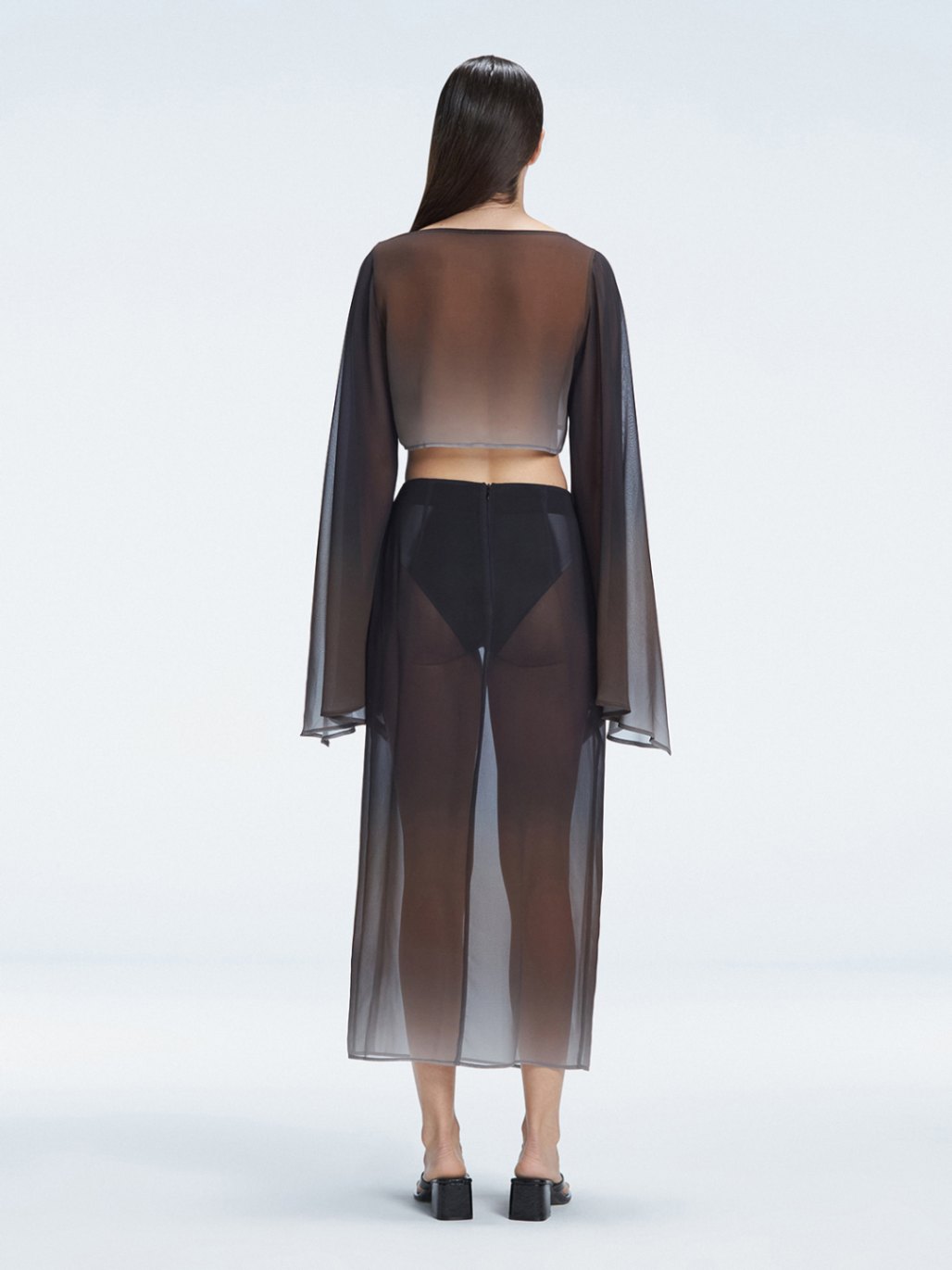 Samantha Black Optical Long Sleeve Crop Top | Moeva | Crop Top | Each week unveils new pieces—luxury swimwear, fluid resort silhouettes, and elevated summer-to-evening essentials designed to carry you from coastal escapes to city nights.