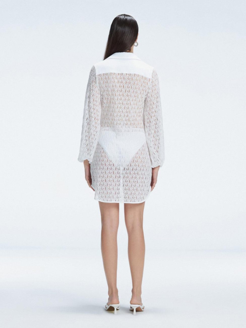 Editorial - Althea White Long Sleeve Lace Mini Kaftan | Moeva | Kaftan | Each week unveils new pieces—luxury swimwear, fluid resort silhouettes, and elevated summer-to-evening essentials designed to carry you from coastal escapes to city nights.