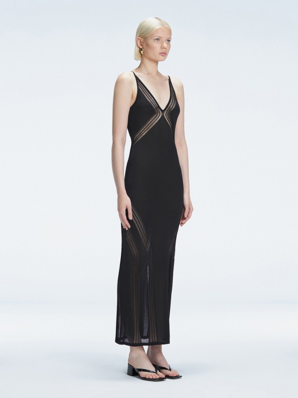 Odessa Black V Neck Knit Maxi Dress | Moeva | Dress | Each week unveils new pieces—luxury swimwear, fluid resort silhouettes, and elevated summer-to-evening essentials designed to carry you from coastal escapes to city nights.
