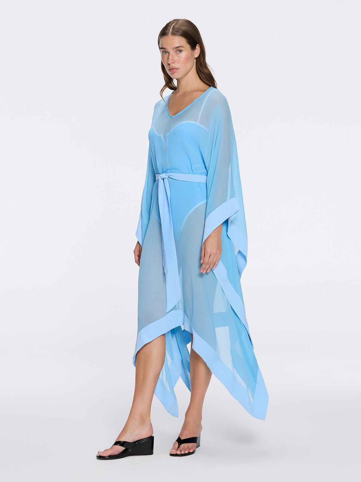 Tata Blue Sheer Gold Buttoned Belted Kaftan with Asymmetric Hem | Moeva | Kaftan | Each week unveils new pieces—luxury swimwear, fluid resort silhouettes, and elevated summer-to-evening essentials designed to carry you from coastal escapes to city nights.