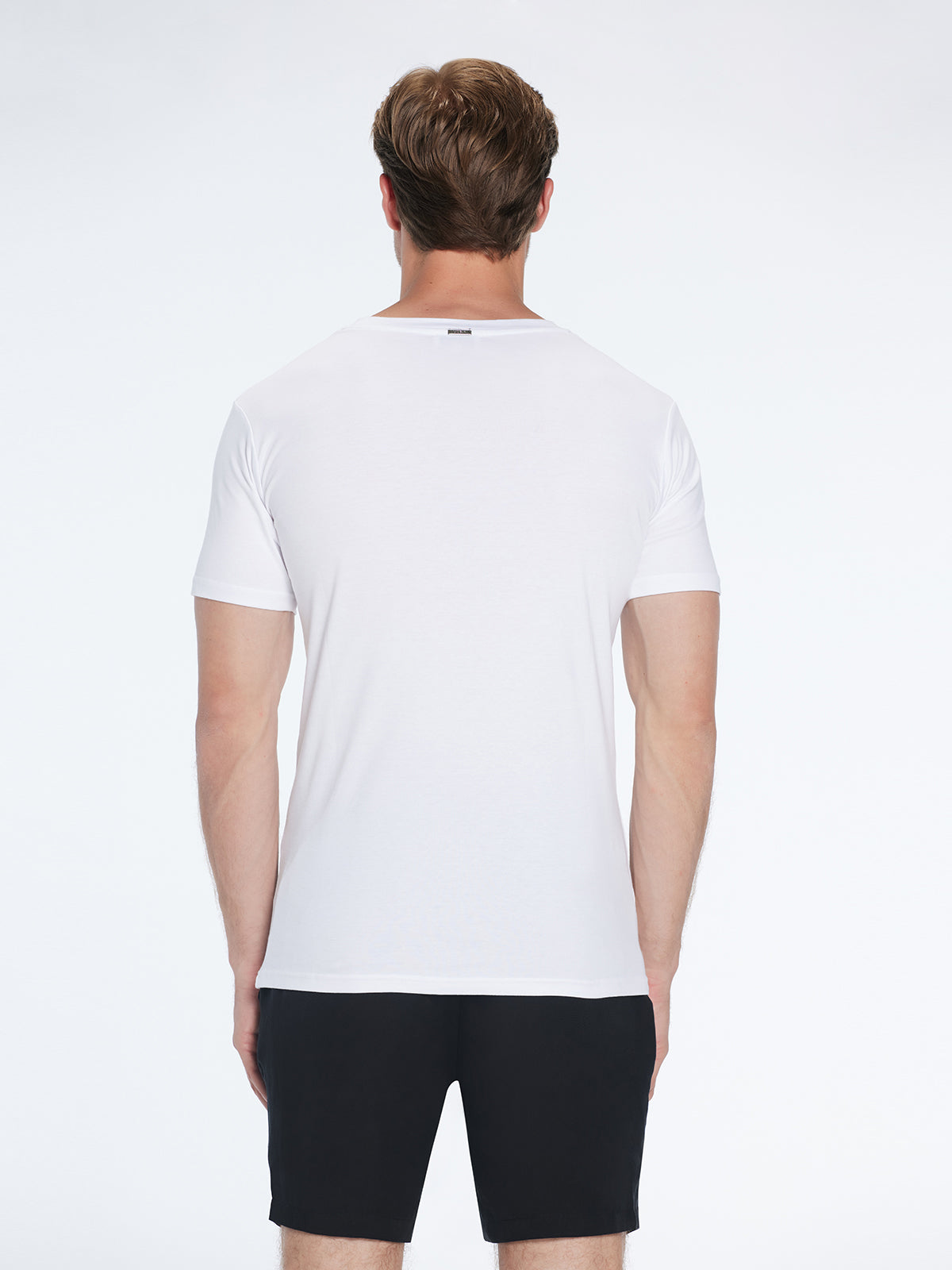 Oscar White Round Neck T-Shirt | Moeva | T-Shirt | Each week unveils new pieces—luxury swimwear, fluid resort silhouettes, and elevated summer-to-evening essentials designed to carry you from coastal escapes to city nights.