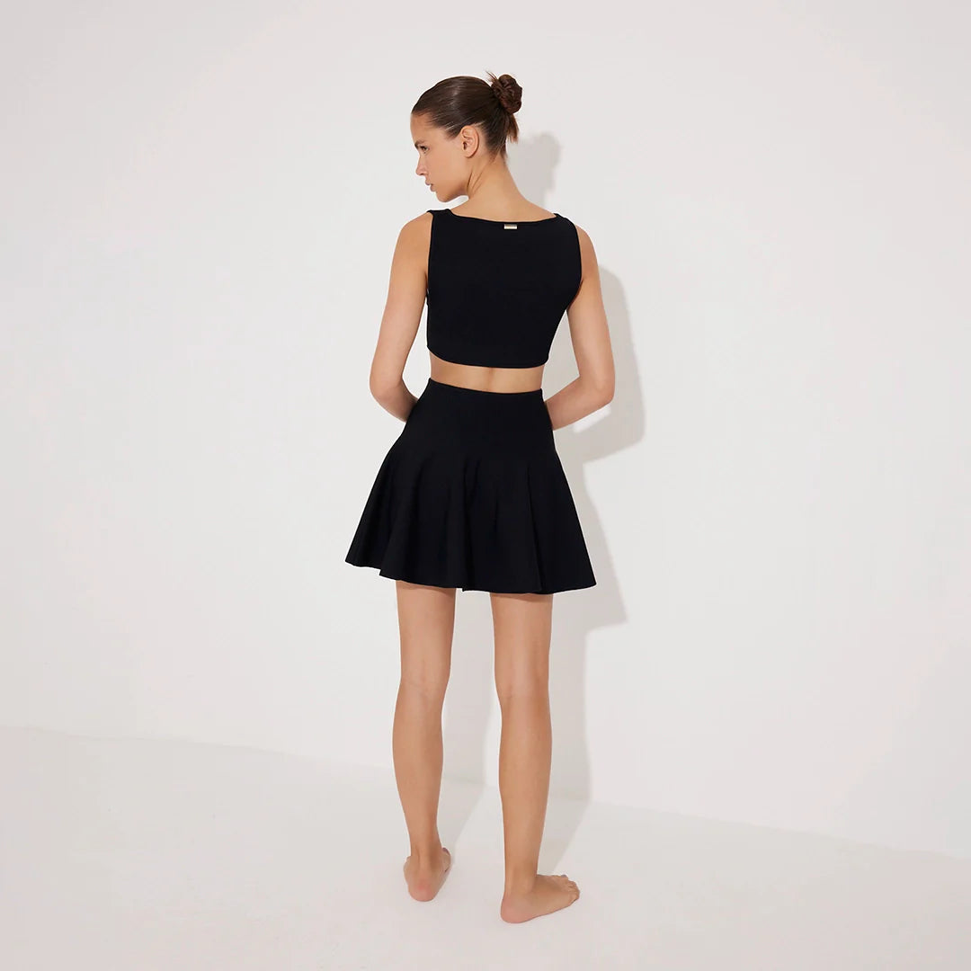 Lanao Black Cut-Out Knit Mini Dress with Gold Detail | Moeva | Dress | Each week unveils new pieces—luxury swimwear, fluid resort silhouettes, and elevated summer-to-evening essentials designed to carry you from coastal escapes to city nights.