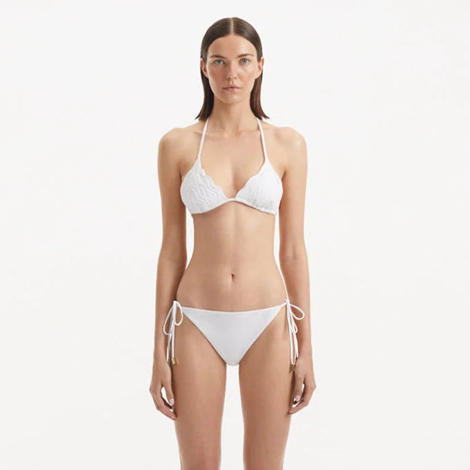 Sarita White Triangle Wave Textured Side Tie Bikini Set | Moeva | Bikini Set | Each week unveils new pieces—luxury swimwear, fluid resort silhouettes, and elevated summer-to-evening essentials designed to carry you from coastal escapes to city nights.