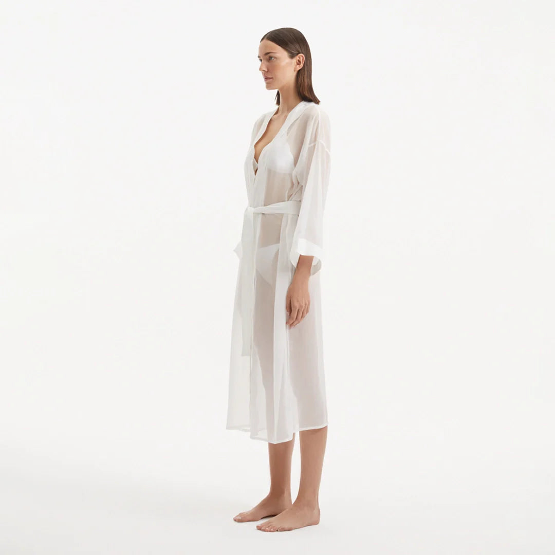 Blaze Long Sleeve Wavy-Trim Belted Sheer White Kaftan | Moeva | Kaftan | Each week unveils new pieces—luxury swimwear, fluid resort silhouettes, and elevated summer-to-evening essentials designed to carry you from coastal escapes to city nights.