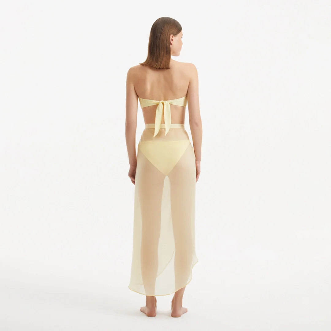 Xander Yellow Sheer Maxi Skirt with Gold Button Details | Moeva | Skirt | Each week unveils new pieces—luxury swimwear, fluid resort silhouettes, and elevated summer-to-evening essentials designed to carry you from coastal escapes to city nights.