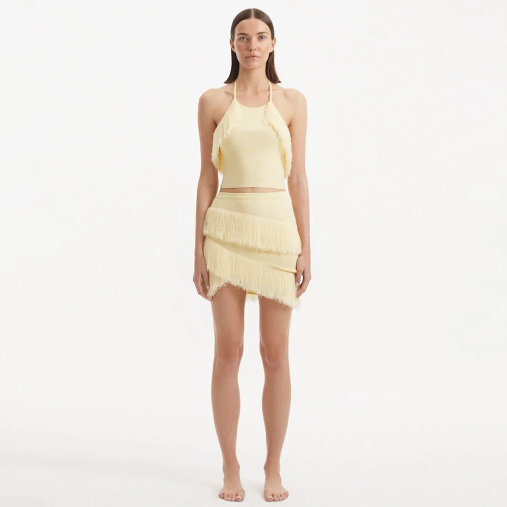 Nebula And Arlo Fringe Asymmetric Yellow Knit Set | Moeva | | Each week unveils new pieces—luxury swimwear, fluid resort silhouettes, and elevated summer-to-evening essentials designed to carry you from coastal escapes to city nights.