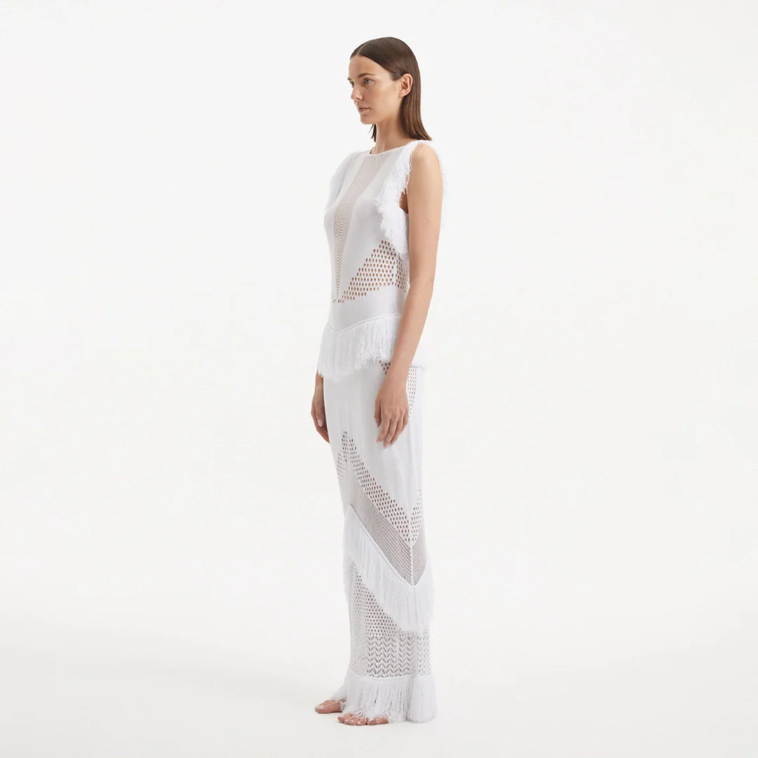 Maris White Knitted Maxi Dress with Fringe and Open Back | Moeva | Dress | Each week unveils new pieces—luxury swimwear, fluid resort silhouettes, and elevated summer-to-evening essentials designed to carry you from coastal escapes to city nights.
