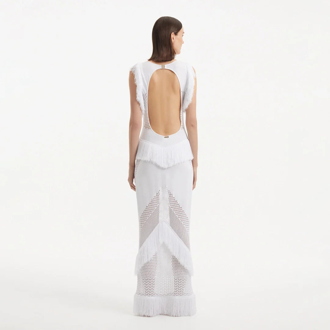 Maris White Knitted Maxi Dress with Fringe and Open Back | Moeva | Dress | Each week unveils new pieces—luxury swimwear, fluid resort silhouettes, and elevated summer-to-evening essentials designed to carry you from coastal escapes to city nights.