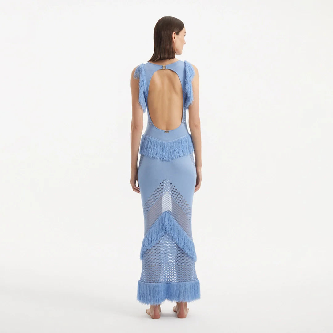 Maris Baby Blue Knitted Maxi Dress with Fringe and Open Back | Moeva | Dress | Each week unveils new pieces—luxury swimwear, fluid resort silhouettes, and elevated summer-to-evening essentials designed to carry you from coastal escapes to city nights.