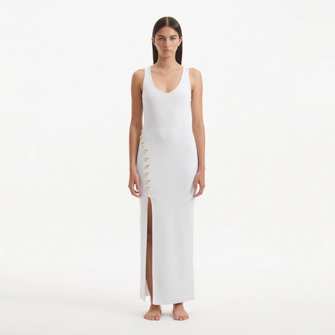 Raine White Knit Maxi Dress with Side Slit & Button Detail | Moeva | Dress | Each week unveils new pieces—luxury swimwear, fluid resort silhouettes, and elevated summer-to-evening essentials designed to carry you from coastal escapes to city nights.