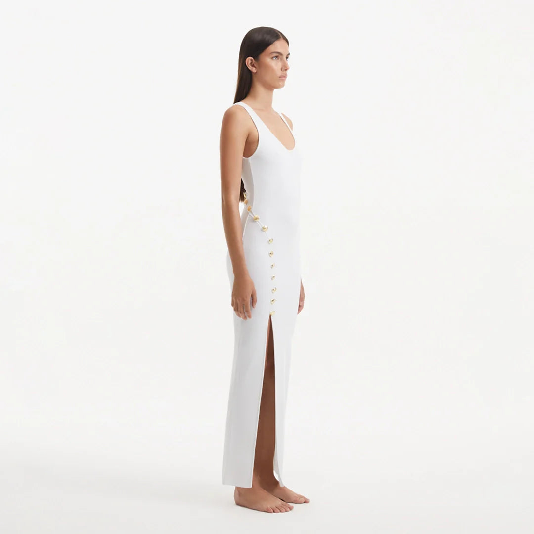Raine White Knit Maxi Dress with Side Slit & Button Detail | Moeva | Dress | Each week unveils new pieces—luxury swimwear, fluid resort silhouettes, and elevated summer-to-evening essentials designed to carry you from coastal escapes to city nights.