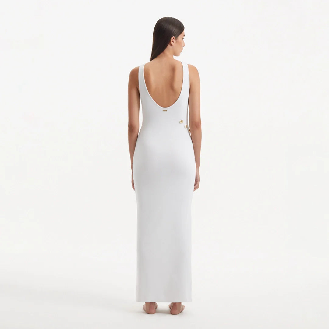 Raine White Knit Maxi Dress with Side Slit & Button Detail | Moeva | Dress | Each week unveils new pieces—luxury swimwear, fluid resort silhouettes, and elevated summer-to-evening essentials designed to carry you from coastal escapes to city nights.