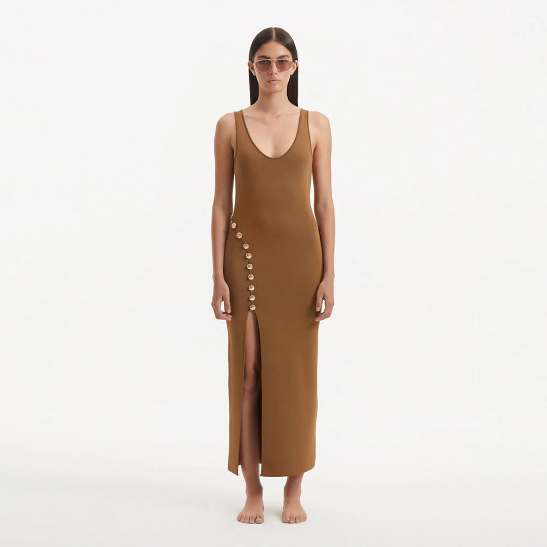Raine Brown Knit Maxi Dress with Side Slit & Button Detail | Moeva | Dress | Each week unveils new pieces—luxury swimwear, fluid resort silhouettes, and elevated summer-to-evening essentials designed to carry you from coastal escapes to city nights.