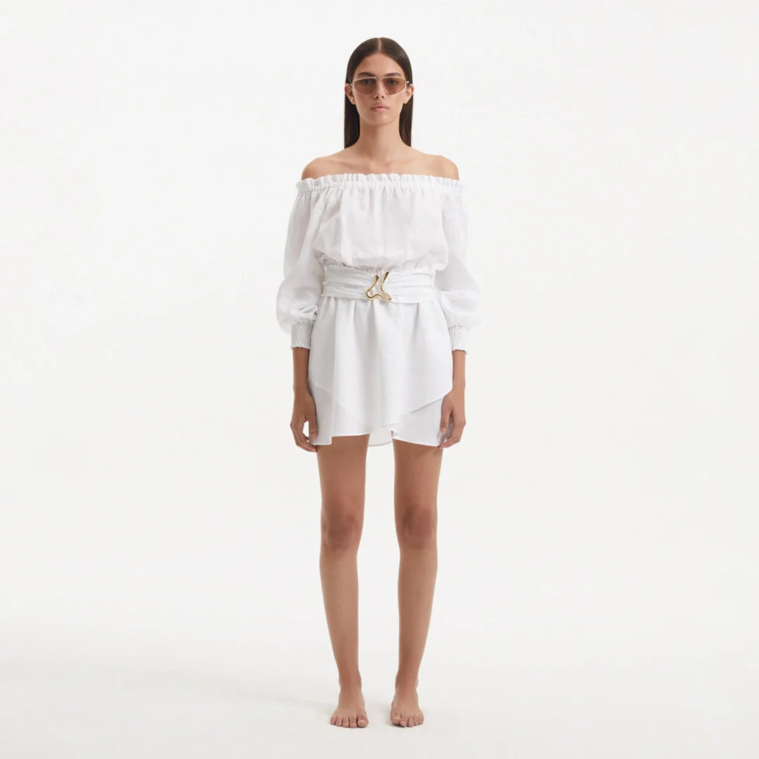 Sumner White Off-Shoulder Linen Mini Dress | Moeva | Dress | Each week unveils new pieces—luxury swimwear, fluid resort silhouettes, and elevated summer-to-evening essentials designed to carry you from coastal escapes to city nights.