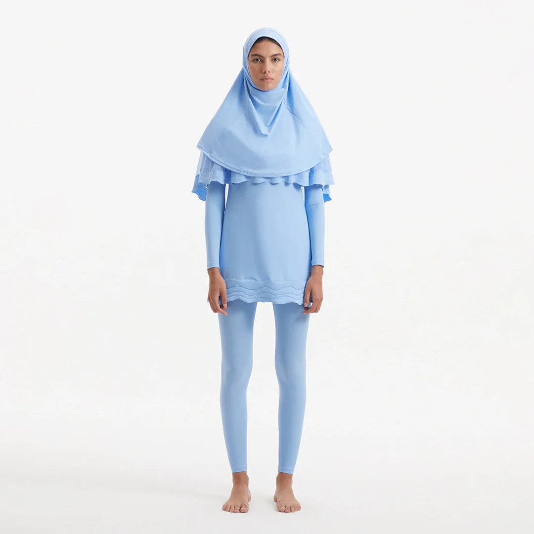Risha Baby Blue Swim Hijab | Moeva | Turban | Each week unveils new pieces—luxury swimwear, fluid resort silhouettes, and elevated summer-to-evening essentials designed to carry you from coastal escapes to city nights.