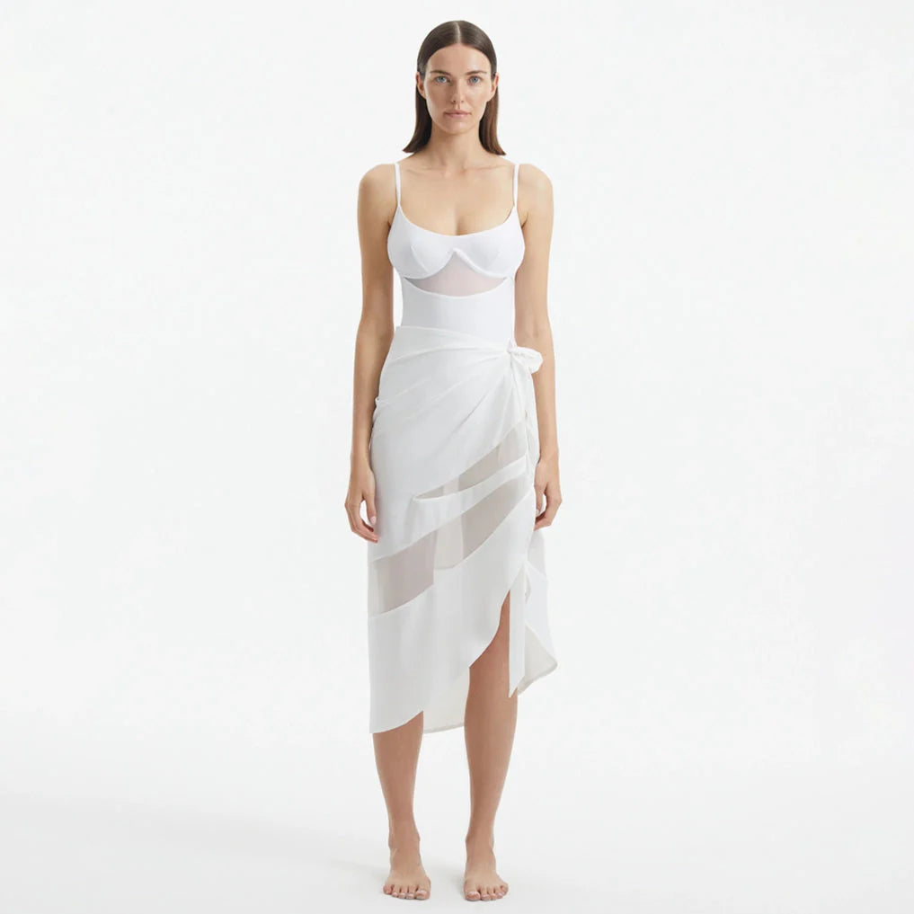 Pelagia White Tie Front Wavy-Trim Sheer Sarong | Moeva | Sarong | Each week unveils new pieces—luxury swimwear, fluid resort silhouettes, and elevated summer-to-evening essentials designed to carry you from coastal escapes to city nights.