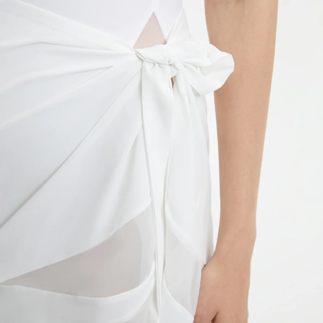 Pelagia White Tie Front Wavy-Trim Sheer Sarong | Moeva | Sarong | Each week unveils new pieces—luxury swimwear, fluid resort silhouettes, and elevated summer-to-evening essentials designed to carry you from coastal escapes to city nights.