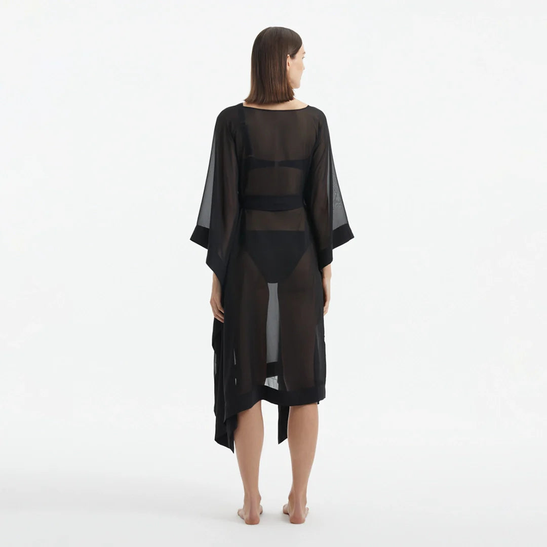 Opal Black Sheer Gold Buttoned Belted Kaftan | Moeva | Kaftan | Each week unveils new pieces—luxury swimwear, fluid resort silhouettes, and elevated summer-to-evening essentials designed to carry you from coastal escapes to city nights.