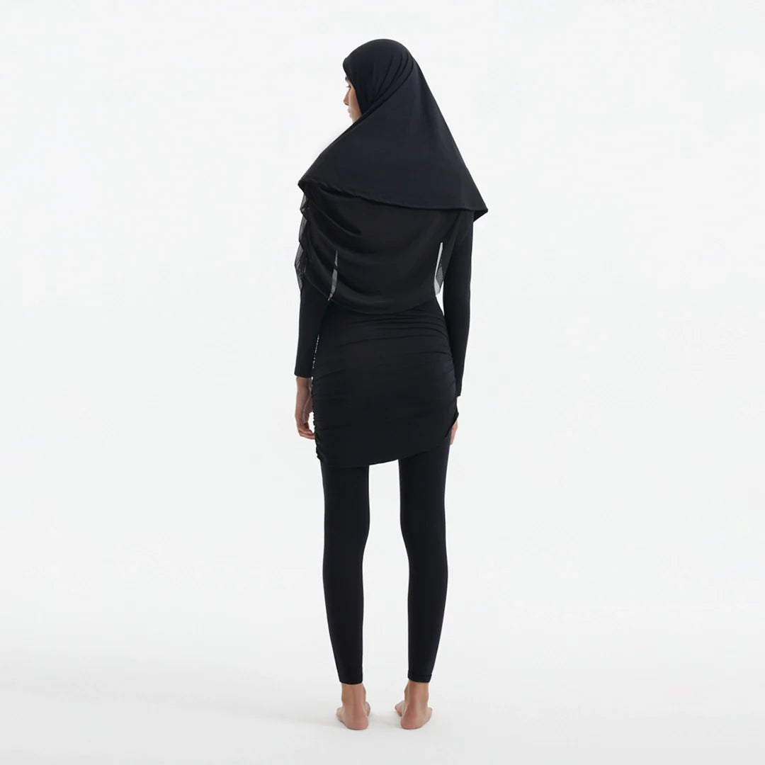 Risha Black Swim Hijab | Moeva | Turban | Each week unveils new pieces—luxury swimwear, fluid resort silhouettes, and elevated summer-to-evening essentials designed to carry you from coastal escapes to city nights.