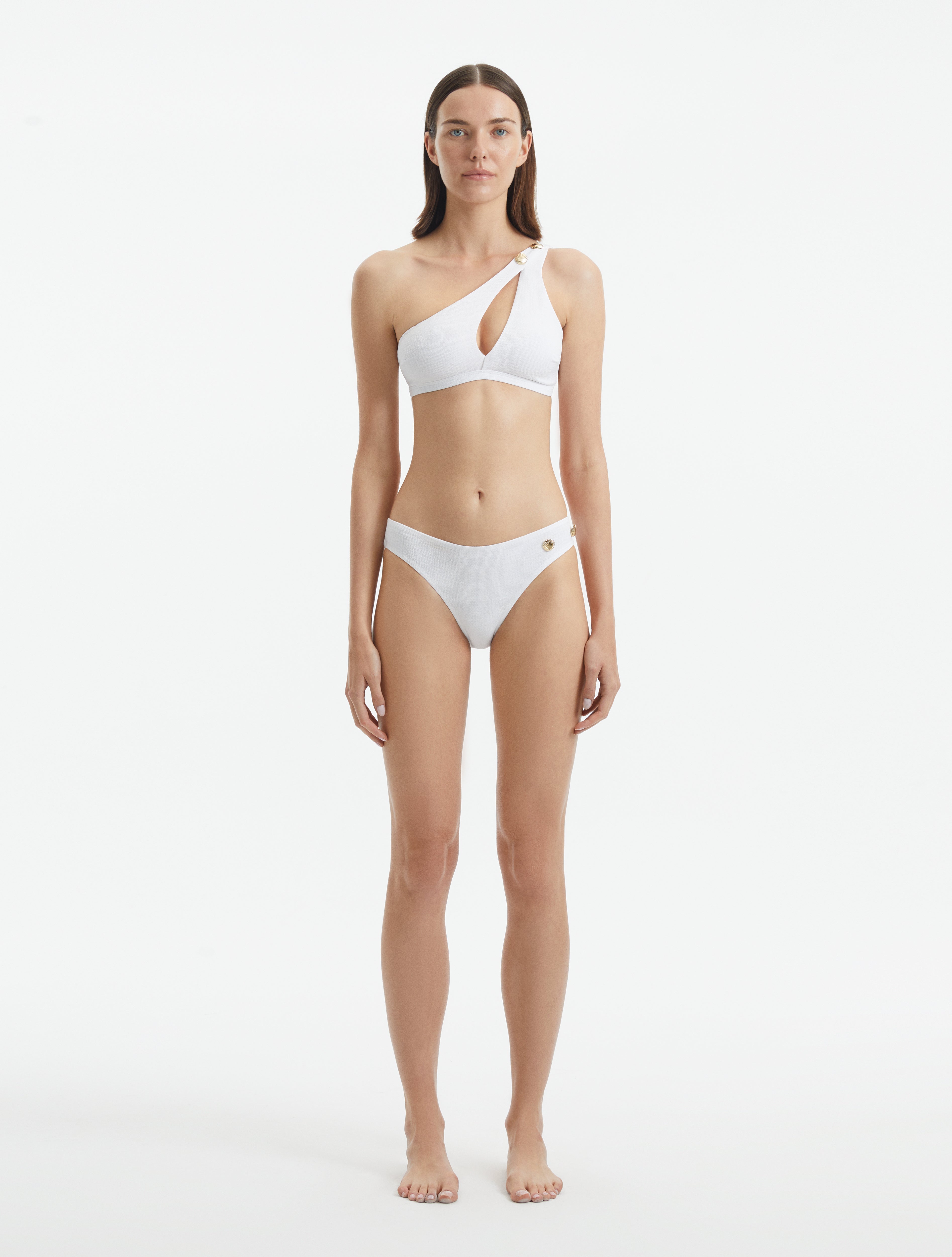Eyre White One Shoulder Textured Bikini Top | Moeva | Bikini Top | Each week unveils new pieces—luxury swimwear, fluid resort silhouettes, and elevated summer-to-evening essentials designed to carry you from coastal escapes to city nights.