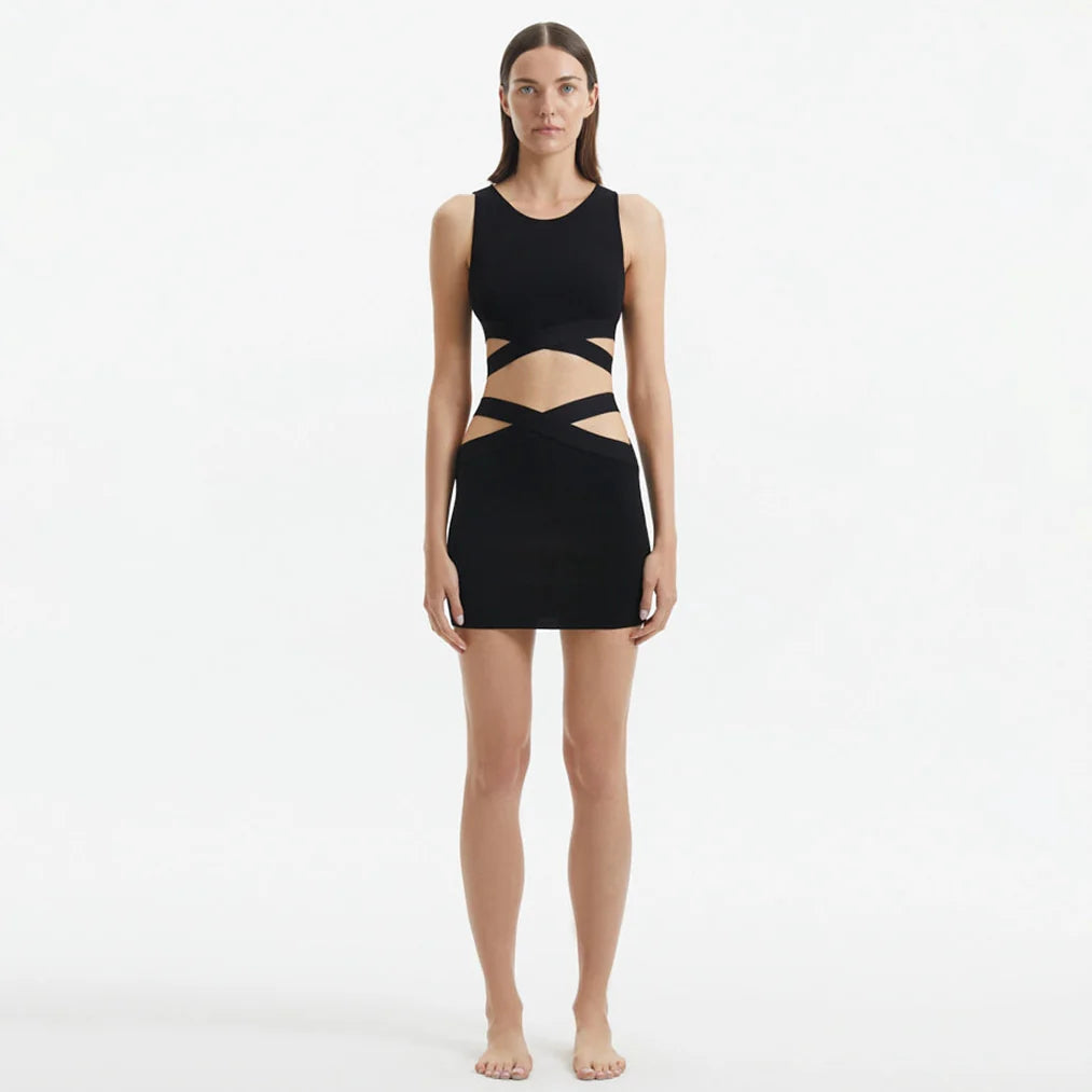 Garda Black Knitted Cut-Out Crop Top | Moeva | Crop Top | Each week unveils new pieces—luxury swimwear, fluid resort silhouettes, and elevated summer-to-evening essentials designed to carry you from coastal escapes to city nights.