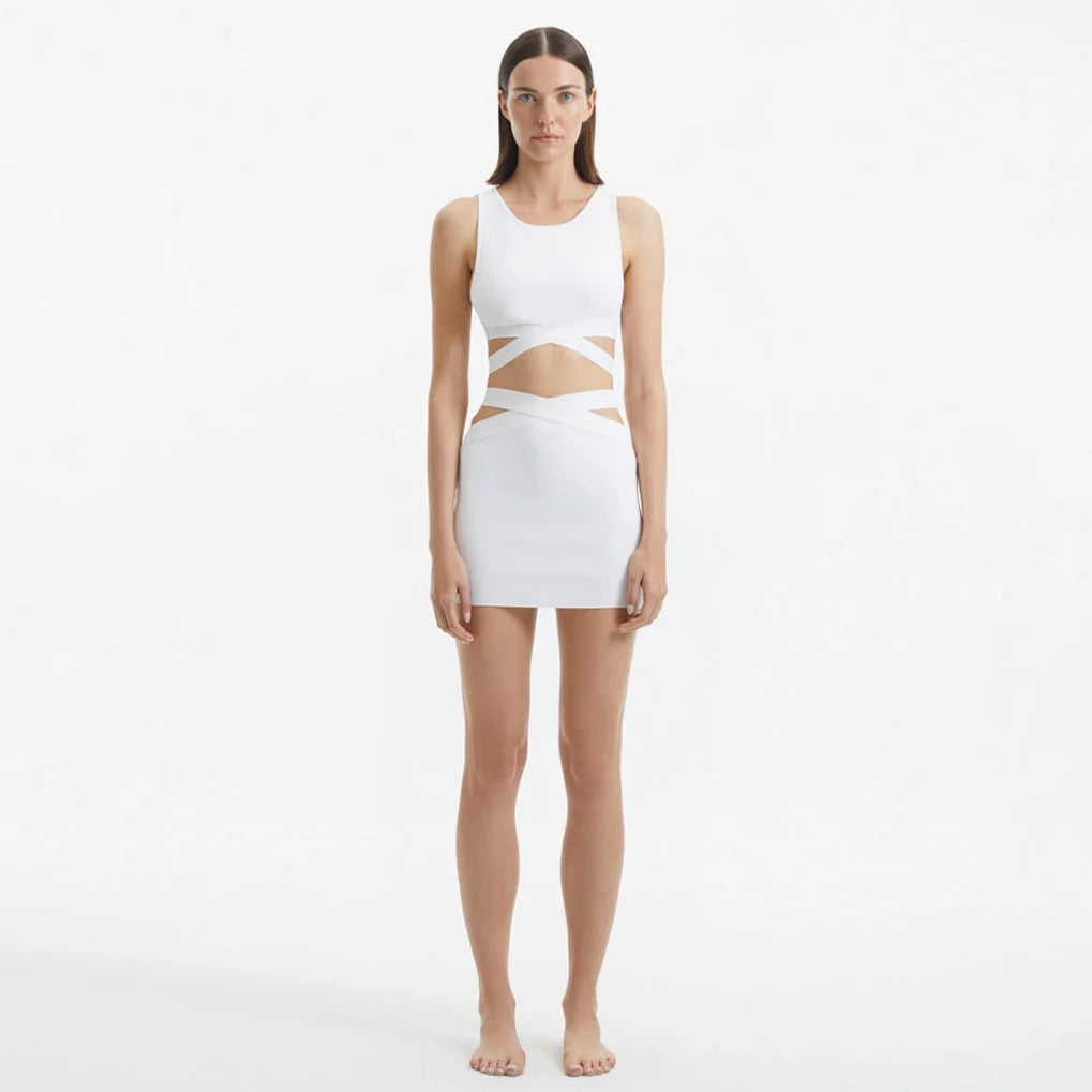 Garda White Knitted Cut-Out Crop Top | Moeva | Crop Top | Each week unveils new pieces—luxury swimwear, fluid resort silhouettes, and elevated summer-to-evening essentials designed to carry you from coastal escapes to city nights.