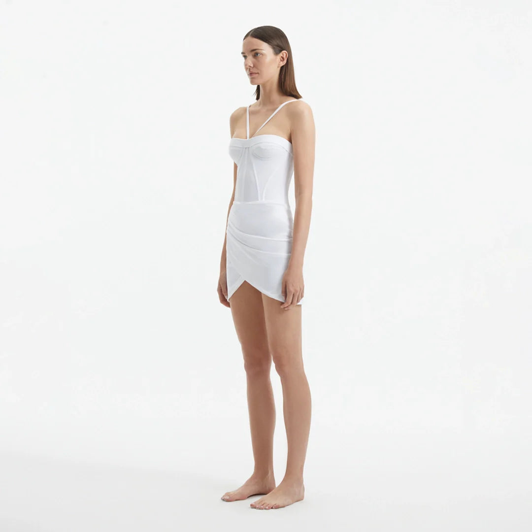 Osaka White Corset Mini Dress with Wrap Skirt | Moeva | Dress | Each week unveils new pieces—luxury swimwear, fluid resort silhouettes, and elevated summer-to-evening essentials designed to carry you from coastal escapes to city nights.