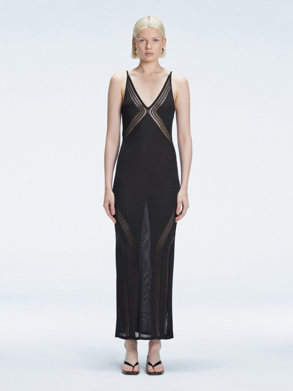 Chiara King - Odessa Black V Neck Knit Maxi Dress | Moeva | Dress | Each week unveils new pieces—luxury swimwear, fluid resort silhouettes, and elevated summer-to-evening essentials designed to carry you from coastal escapes to city nights.