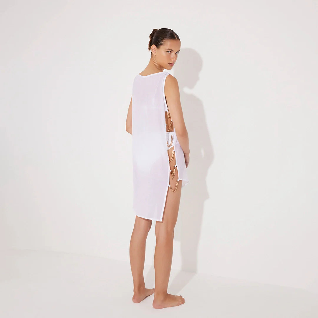 Veronica White Sheer Mini Dress with Side Chain Detail | Moeva | Dress | Each week unveils new pieces—luxury swimwear, fluid resort silhouettes, and elevated summer-to-evening essentials designed to carry you from coastal escapes to city nights.