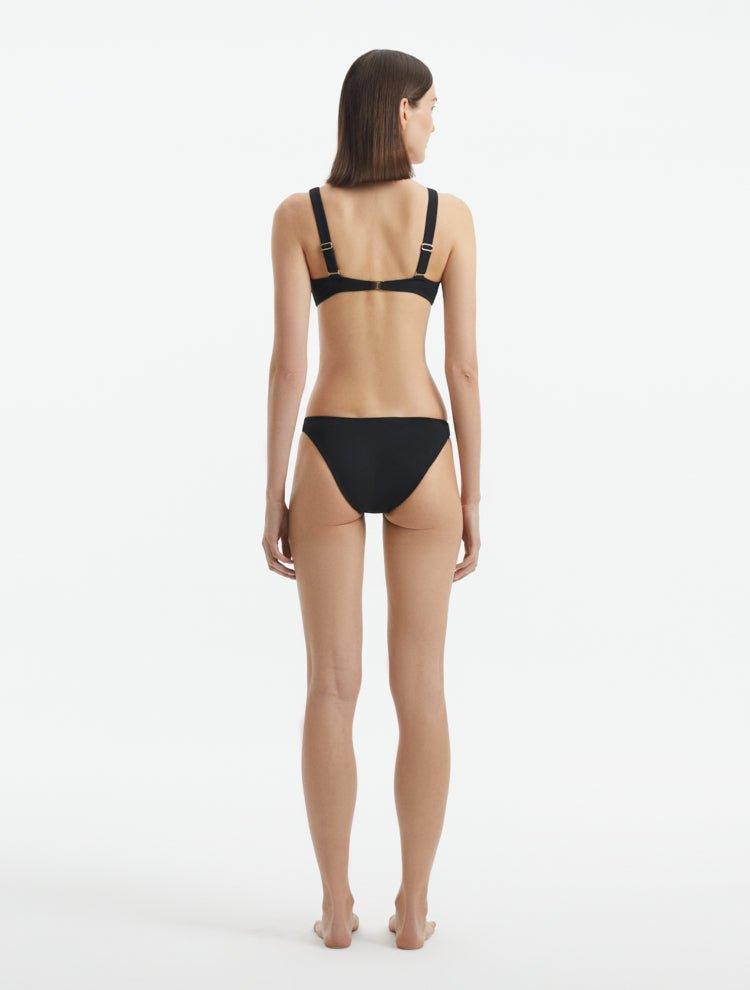 Aeron Black V Neck Textured Bikini Top | Moeva | Bikini Top | Each week unveils new pieces—luxury swimwear, fluid resort silhouettes, and elevated summer-to-evening essentials designed to carry you from coastal escapes to city nights.