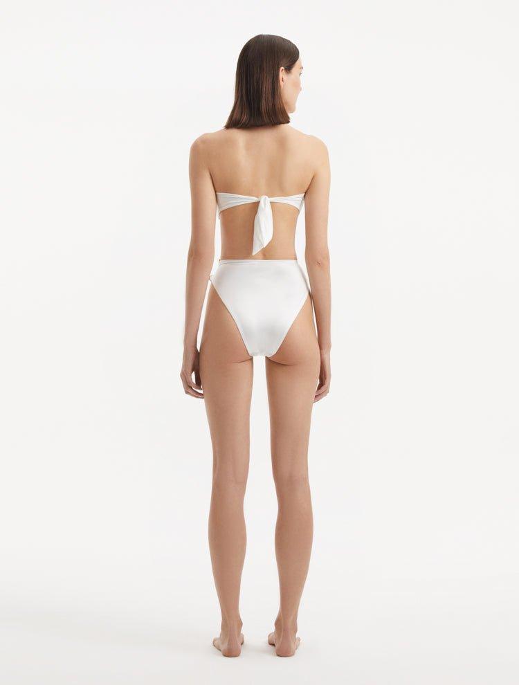 Clyde White Bandeau Satin Bikini Top | Moeva | Bikini Top | Each week unveils new pieces—luxury swimwear, fluid resort silhouettes, and elevated summer-to-evening essentials designed to carry you from coastal escapes to city nights.