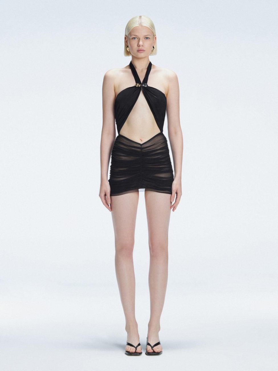 Lisa Kistermann- Carolina Black Cut-Out Halter Swimdress | Moeva | Swimsuit | Each week unveils new pieces—luxury swimwear, fluid resort silhouettes, and elevated summer-to-evening essentials designed to carry you from coastal escapes to city nights.