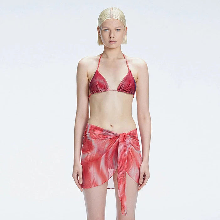 Evita Red Optical Tie Side Sarong | Moeva | Sarong | Each week unveils new pieces—luxury swimwear, fluid resort silhouettes, and elevated summer-to-evening essentials designed to carry you from coastal escapes to city nights.