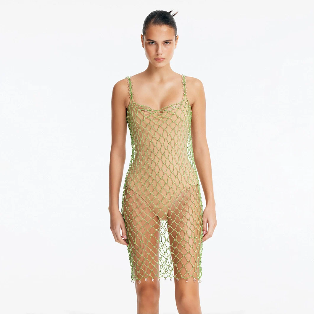 Flora Green Scoop-Neck Swimsuit with Beaded Macrame Overlay | Moeva | Swimsuit | Each week unveils new pieces—luxury swimwear, fluid resort silhouettes, and elevated summer-to-evening essentials designed to carry you from coastal escapes to city nights.