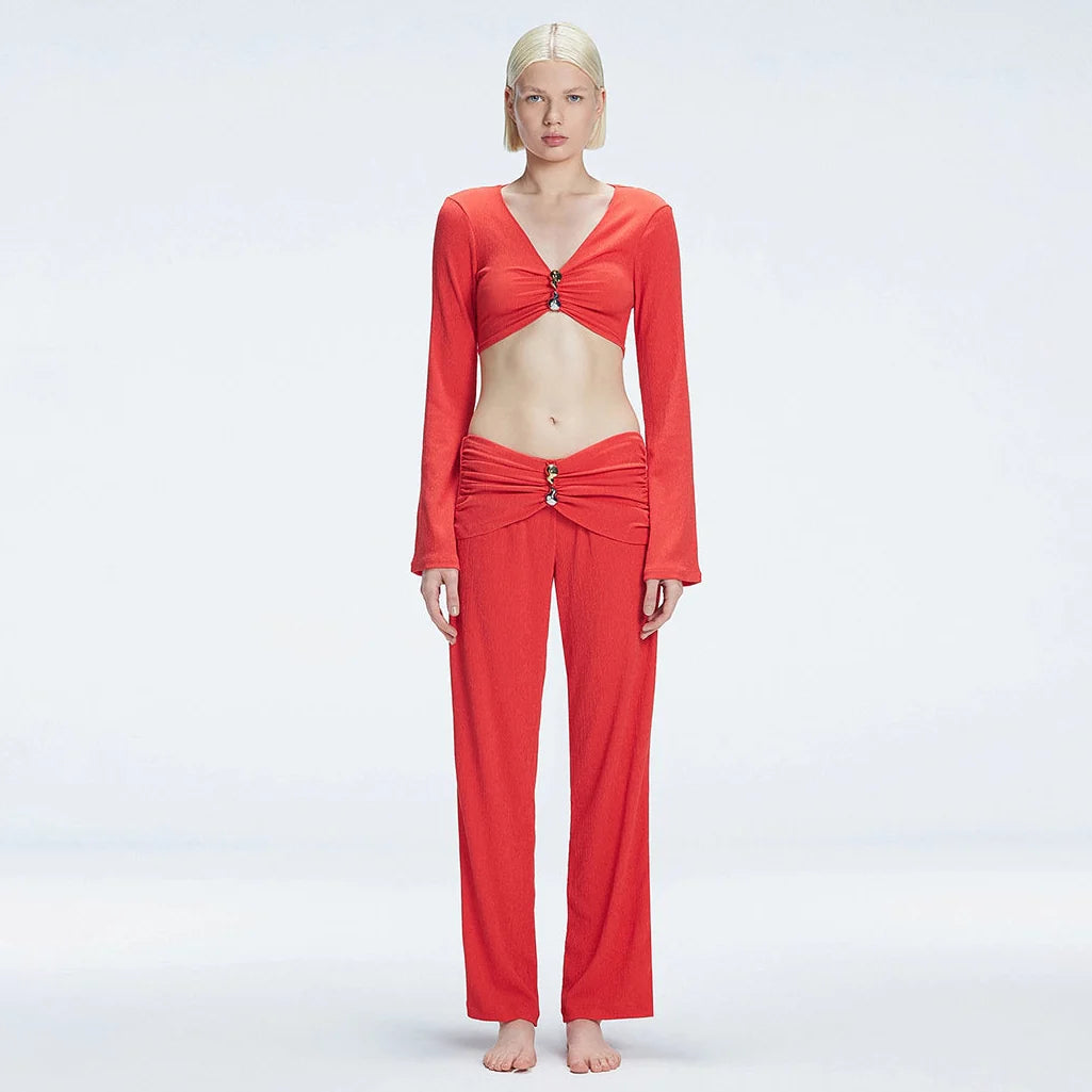 Sirenia Long Sleeve Crop Top and Helena Straight Leg Accessorised Pants Red Set | Moeva | Set | Each week unveils new pieces—luxury swimwear, fluid resort silhouettes, and elevated summer-to-evening essentials designed to carry you from coastal escapes to city nights.