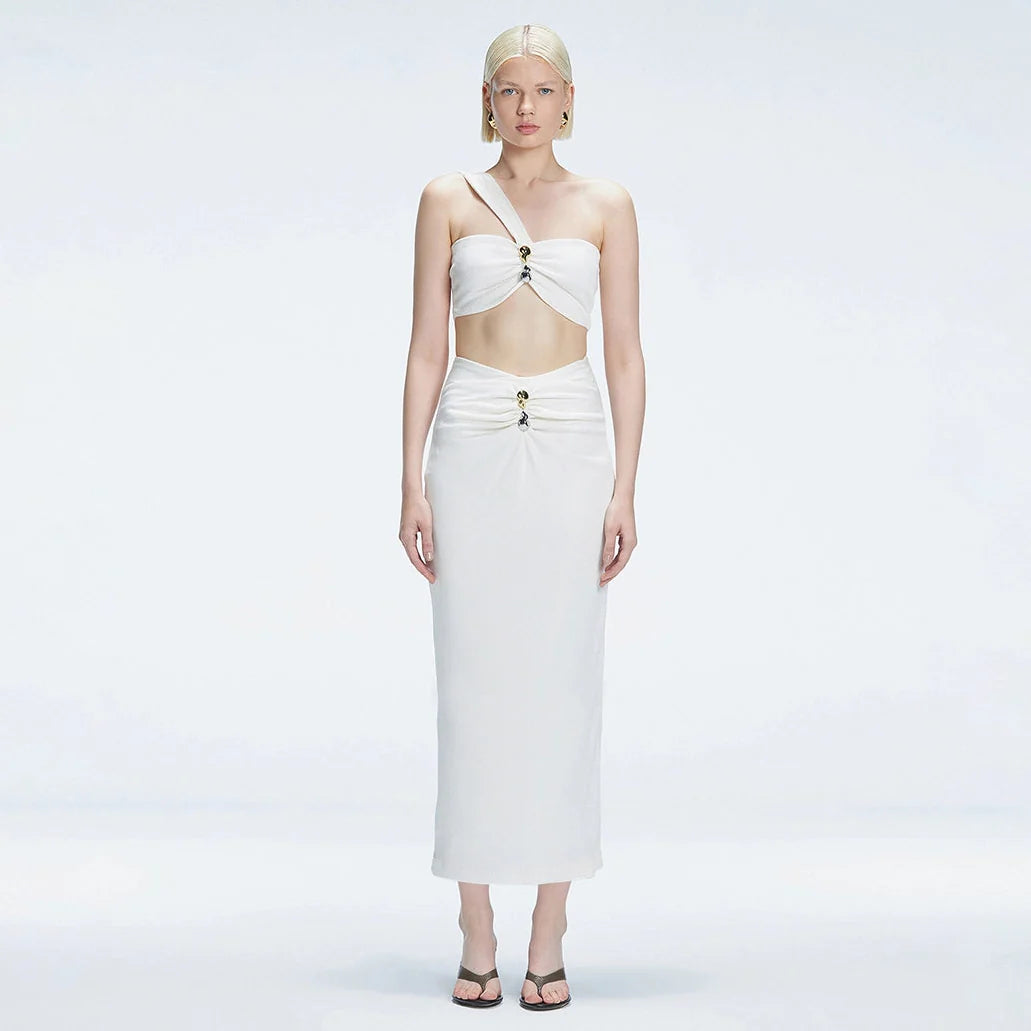 Zoe Pastelle - Lane One-Shoulder White Crop Top and Esmeralda Maxi Skirt Set | Moeva | Set | Each week unveils new pieces—luxury swimwear, fluid resort silhouettes, and elevated summer-to-evening essentials designed to carry you from coastal escapes to city nights.