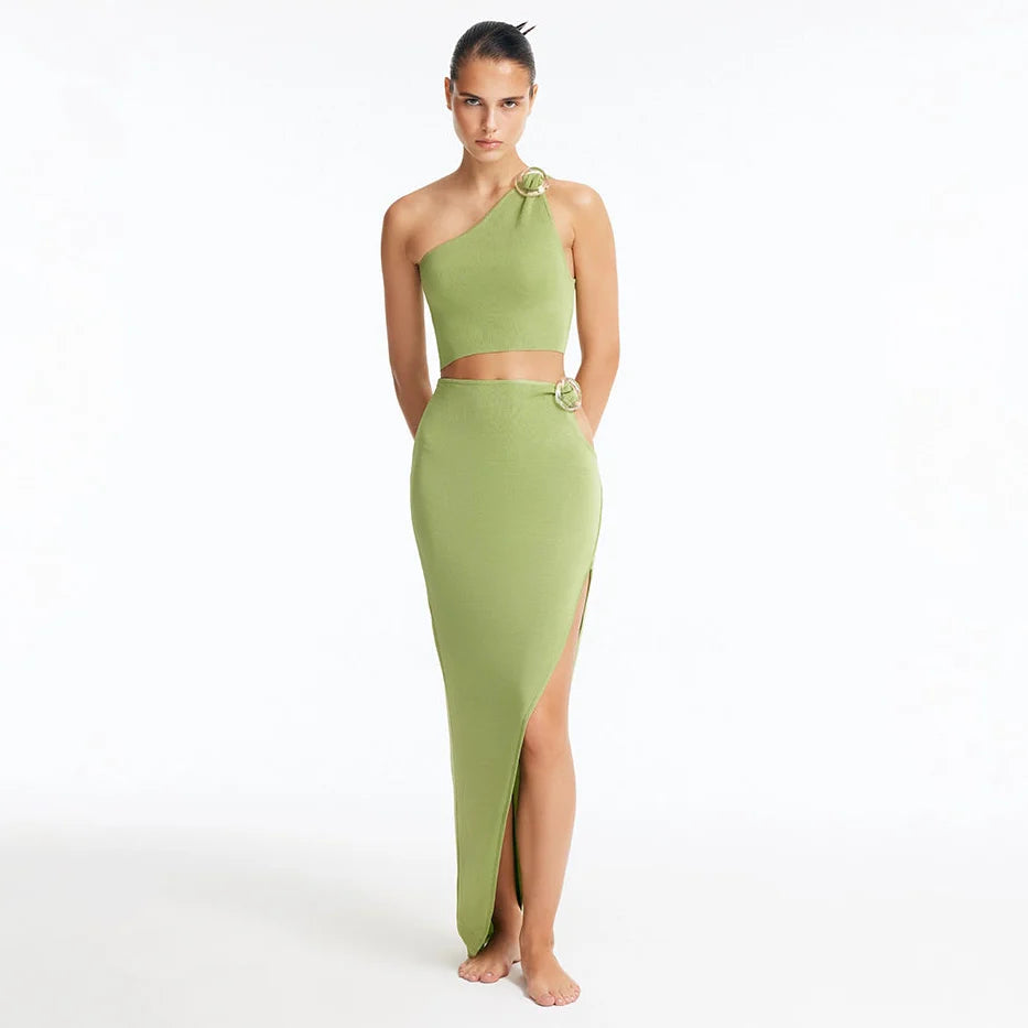 Eila Green One Shoulder Knitted Crop Top and Lyndon Green Knitted Skirt with Side Slit | Moeva | Set | Each week unveils new pieces—luxury swimwear, fluid resort silhouettes, and elevated summer-to-evening essentials designed to carry you from coastal escapes to city nights.