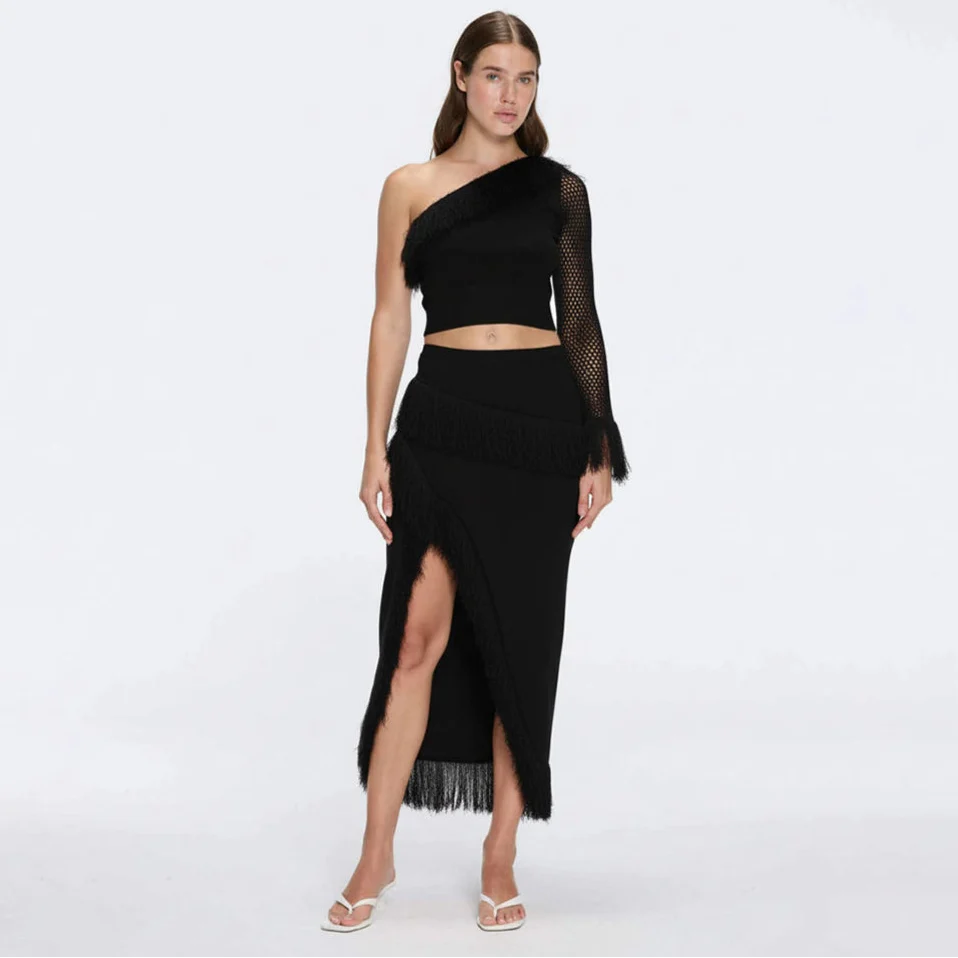 Monroe & Alani Fringe Asymmetric Knit Black Set | Moeva | Set | Each week unveils new pieces—luxury swimwear, fluid resort silhouettes, and elevated summer-to-evening essentials designed to carry you from coastal escapes to city nights.