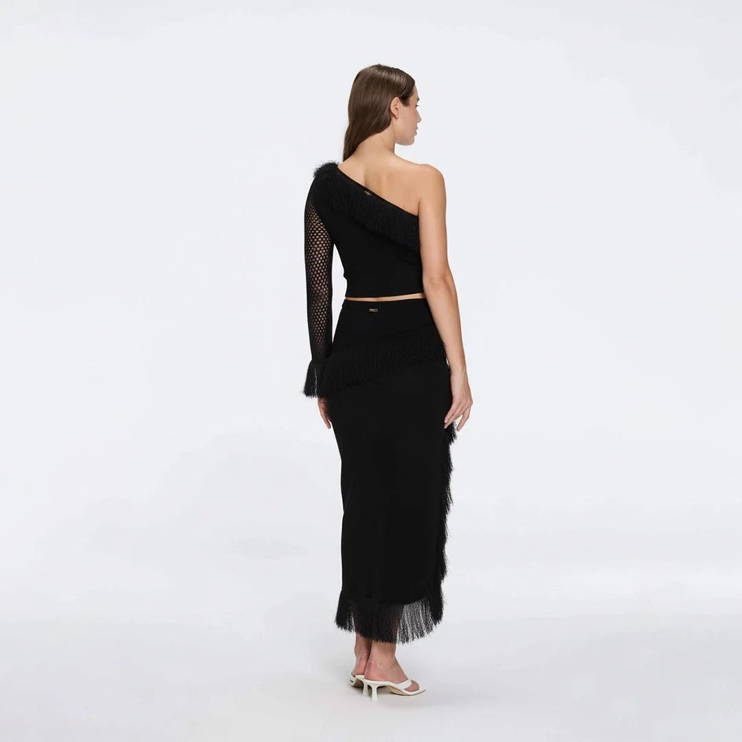 Monroe Black One-Shoulder Knit Top with Fringe & Mesh Sleeve | Moeva | Crop Top | Each week unveils new pieces—luxury swimwear, fluid resort silhouettes, and elevated summer-to-evening essentials designed to carry you from coastal escapes to city nights.